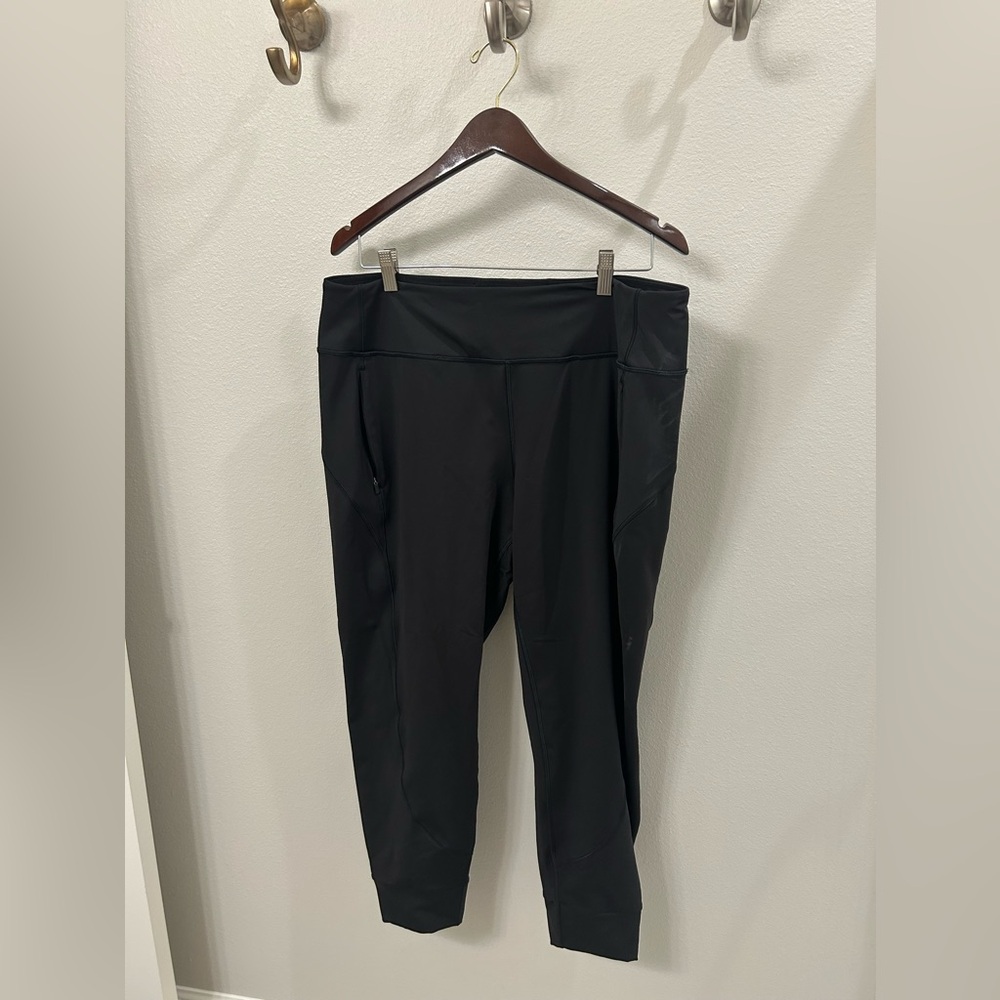 TWO PAIRS of Athleta Leggings/Pants—black and green